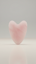 Rose quartz gua sha tool for gentle sculpting